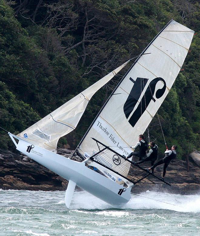 Michael Coxon and his Thurlow Fisher Lawyers team cenrtainly know how to drive an 18ft Skiff © Frank Quealey